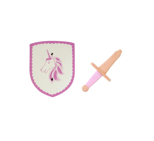 Kinderset bestehend aus einem weißen Holzschild mit rosa Einhorn-Motiv und wellenförmigem Rand sowie einem Holzschwert mit hellrosa Griff. Beide Teile liegen nebeneinander auf weißem Hintergrund.